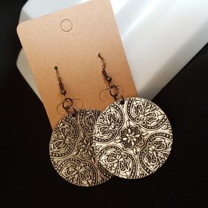 Metal round earrings with beautiful detail
